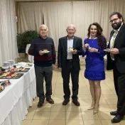 Dr. Petruška, prof. Bača, doc. Jenčová a Dr. Bačinský počas vianočného posedenia (v roku 2024)