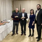 Dr. Petruška, prof. Bača, doc. Vašaničová a Dr. Bačinský počas vianočného posedenia (v roku 2024)